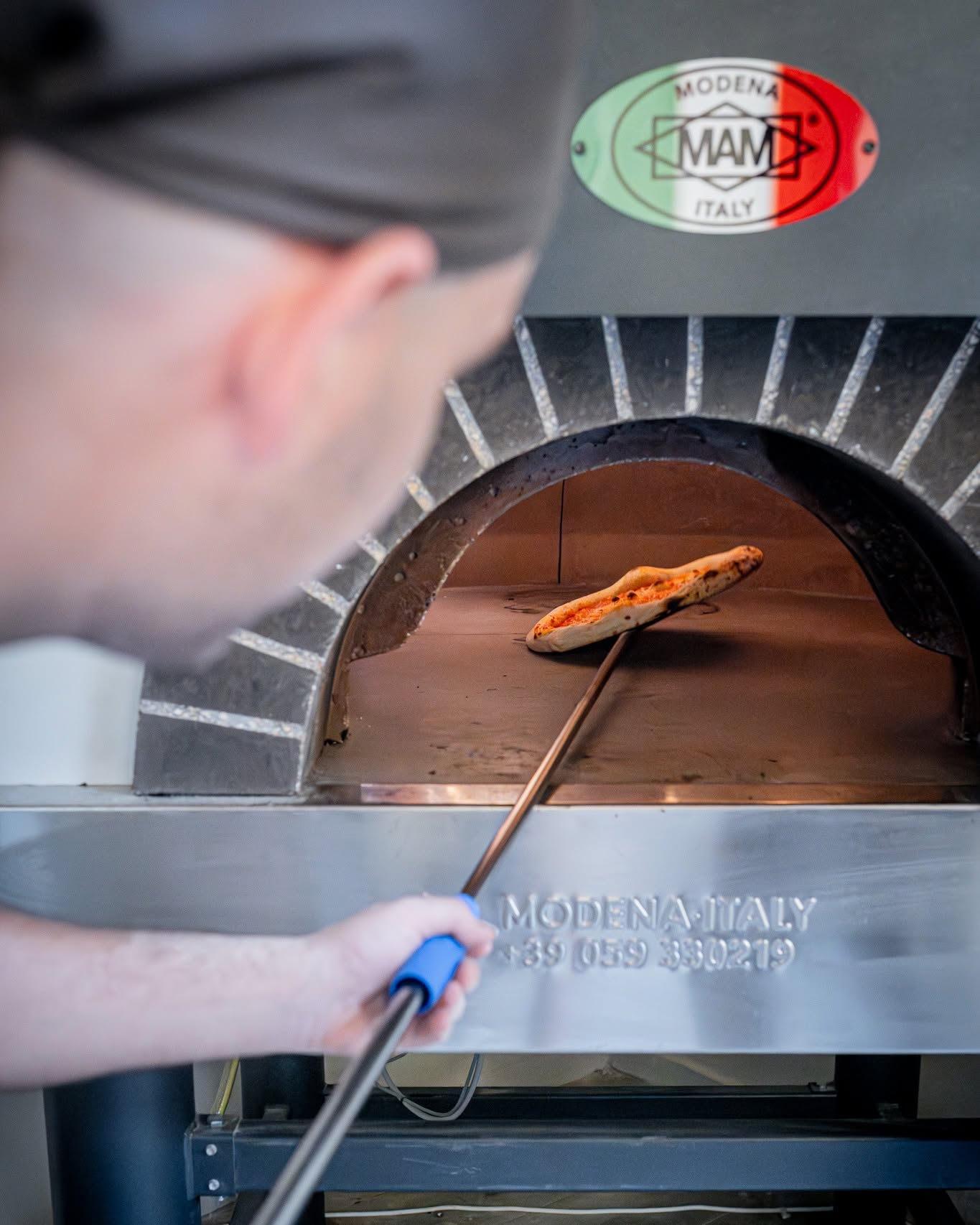 Elaboración artesanal de la pizza Umore